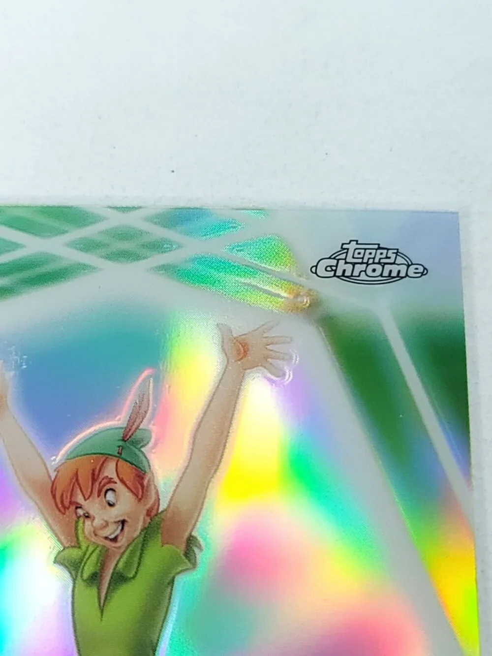 Peter Pan Topps 2026 Disney Neon Holo Chrome Refractor Limited 068/199 CNE